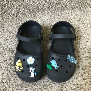 Girls Crocs Size 4W with removable charms